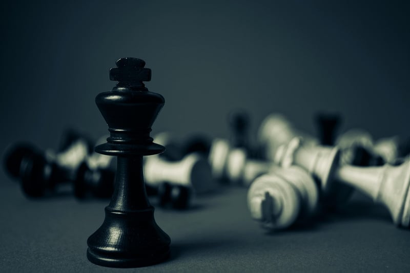 Chess pieces representing strategic thinking in historical revisionism